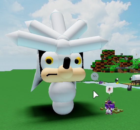 Me with large unfinished Silver statue, with only head and featureless torso